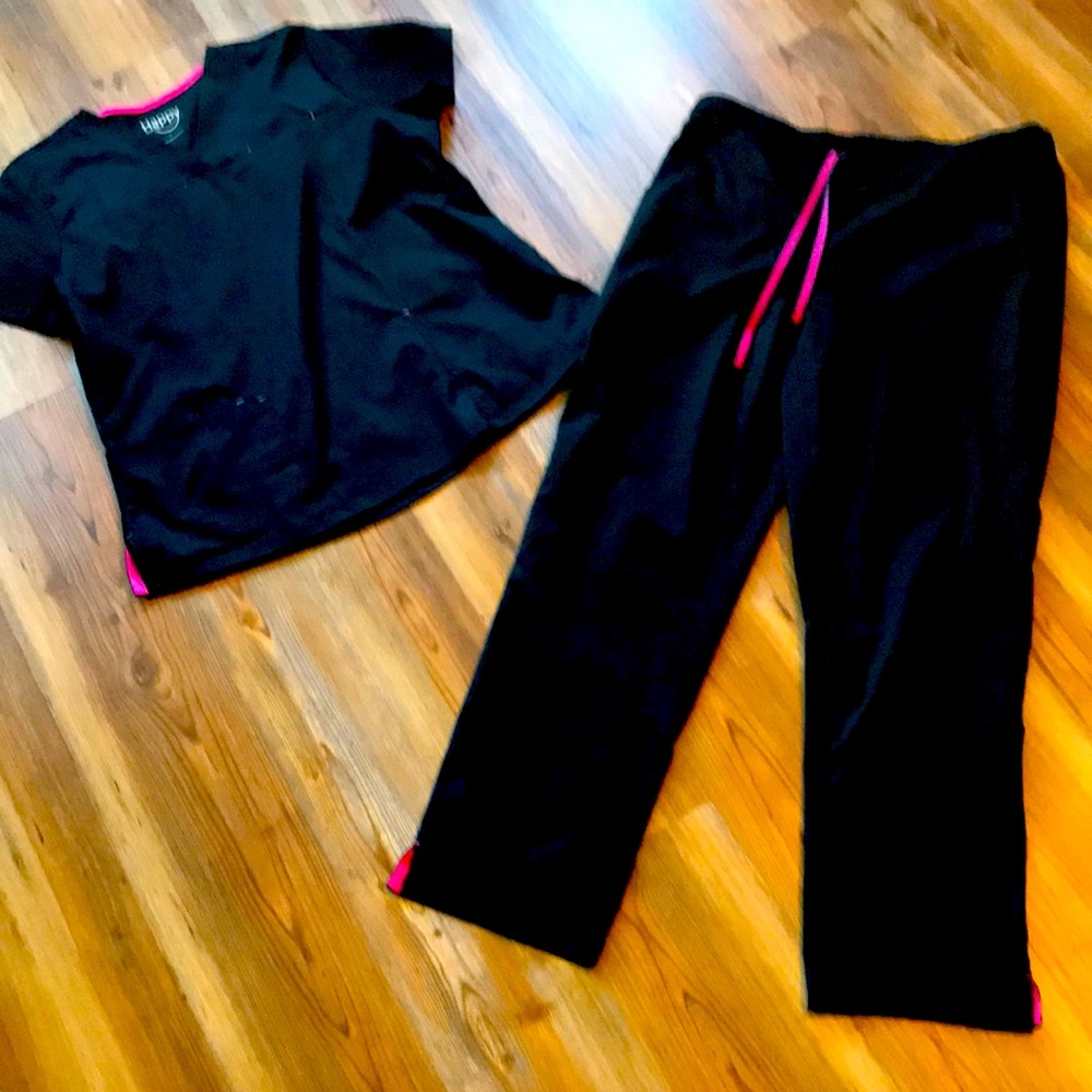 Black with pink accents. Lg medical scrubs